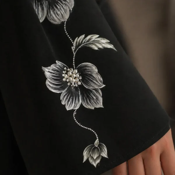black hand painted abaya art with floral design