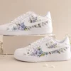 Luxury floral sneakers with elegant handcrafted floral artwork